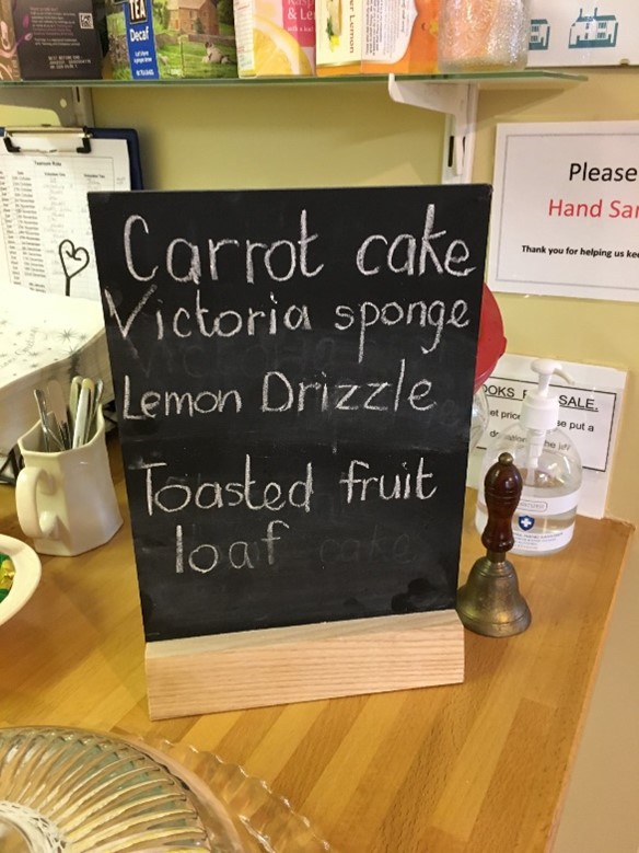 A display board showing the collection of cakes available