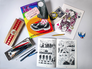 A collection of Kate Charlesworth material including books, illustrations and a pencil case