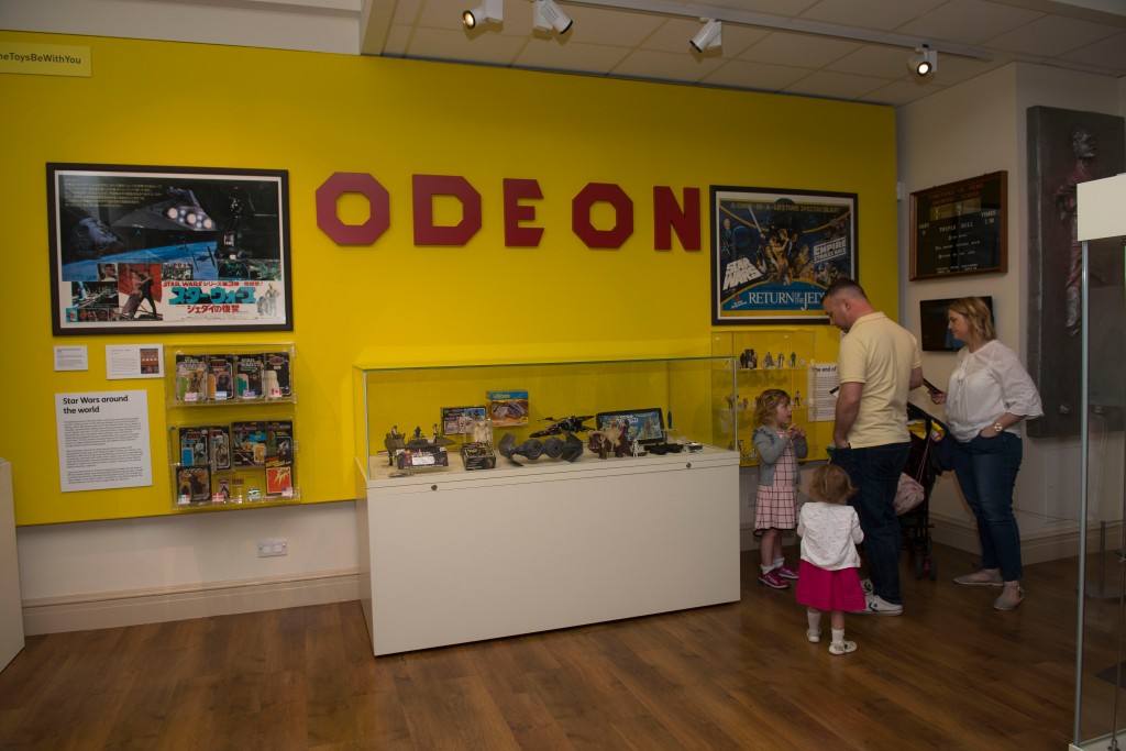 A shot from the exhibition an odeon sign is clearly visible
